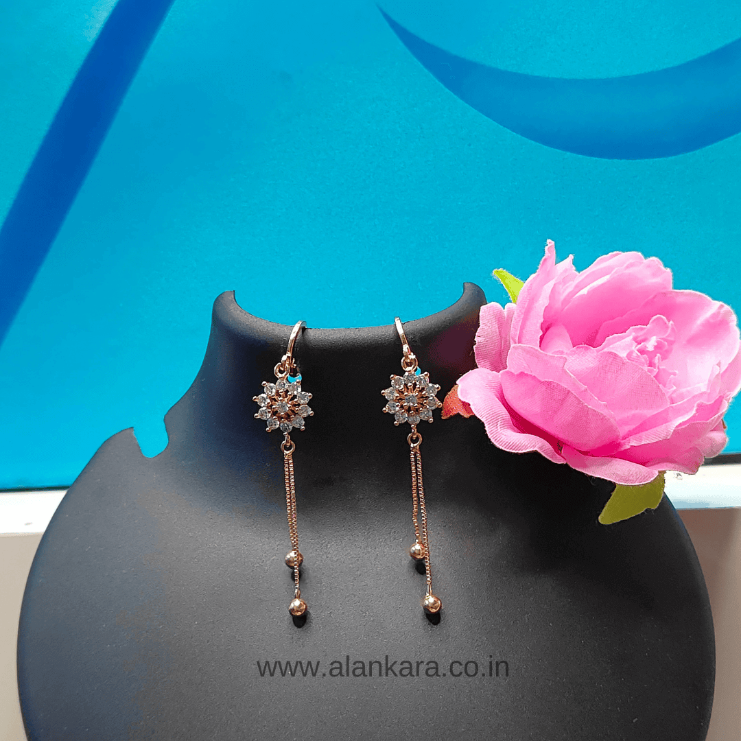 Golden white floral dangler earrings