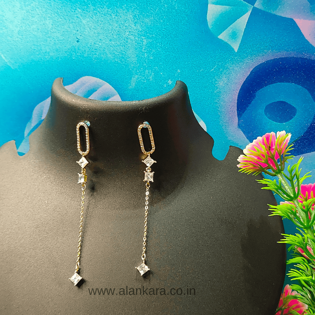 White capsule dangler earrings