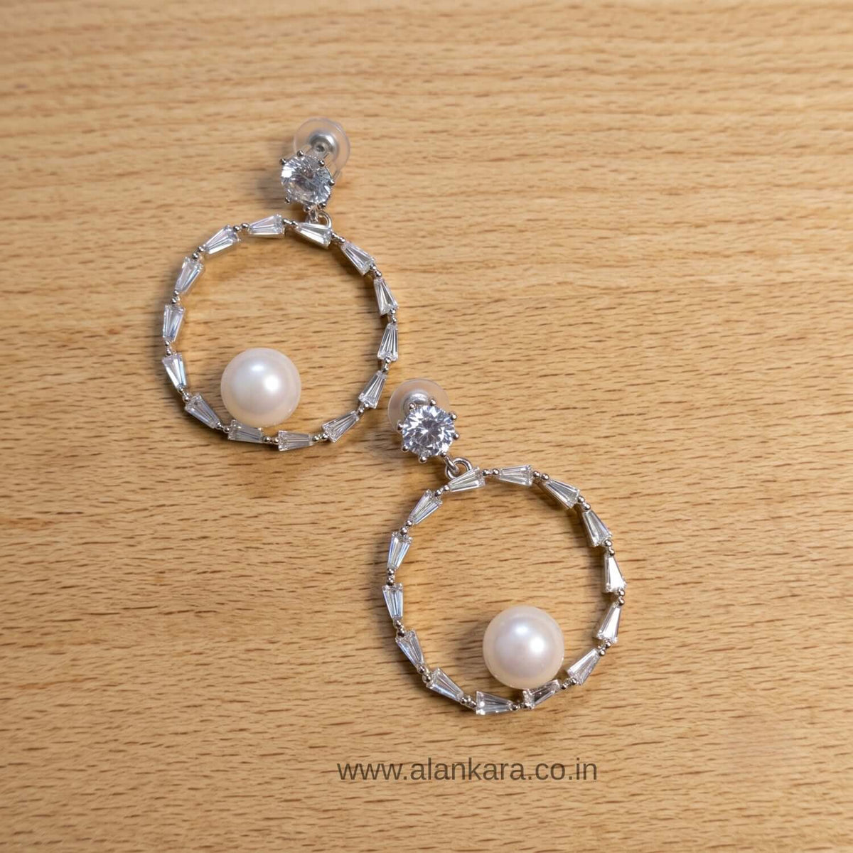 White Pearl crystal Hoop earrings featuring elegant alloy and stainless-steel design with crystal details.