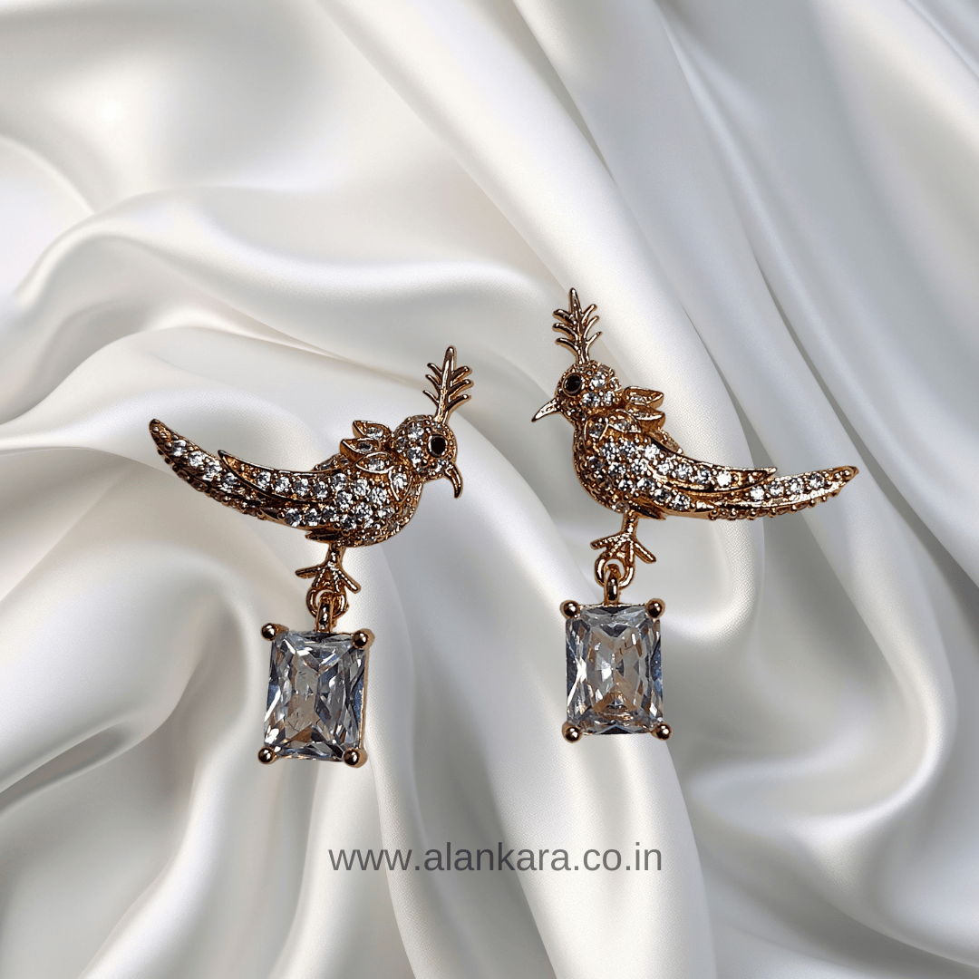 Golden peacock studs - Stylish western earrings | ALANKARA