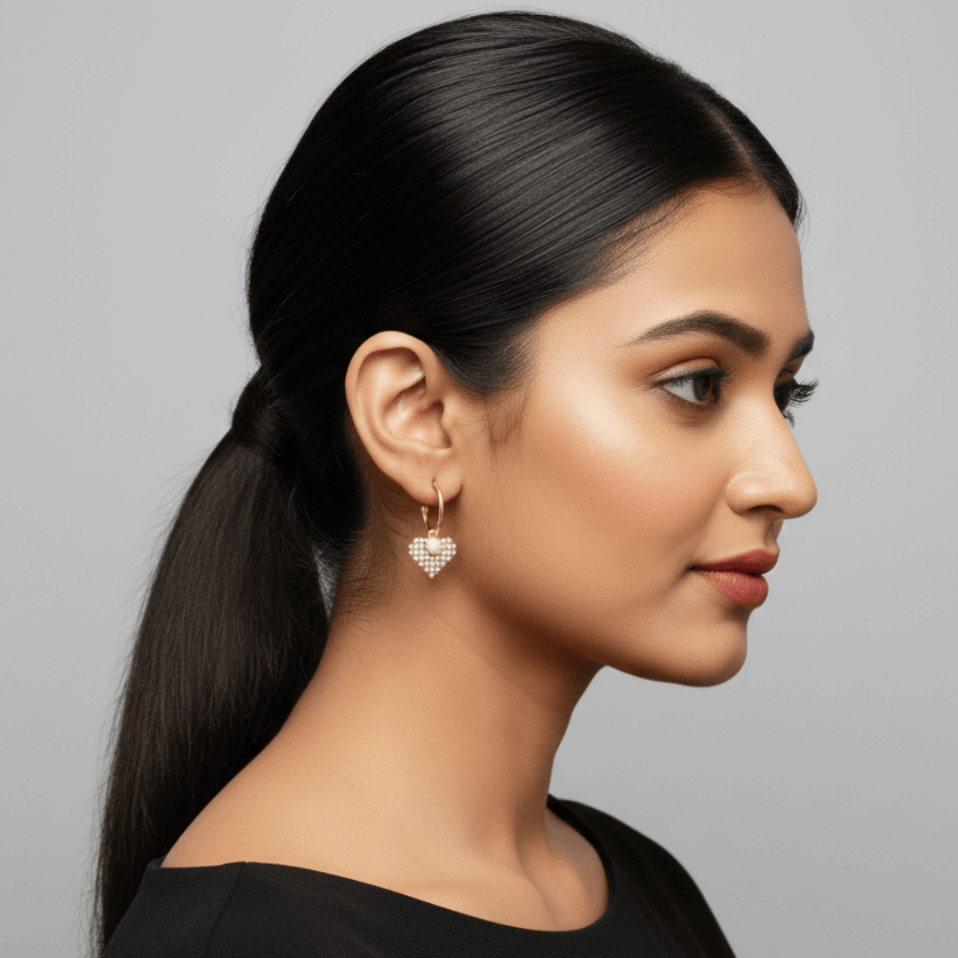 Golden Pearl Heart Hoop earring worn by a model highlighting stylish design and elegance.