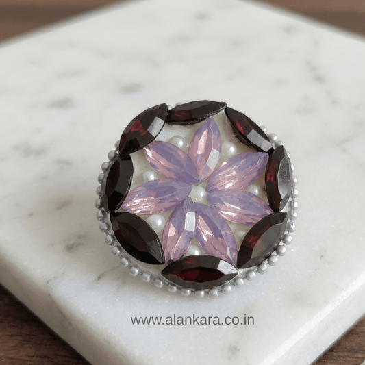 Black & Lavender Crystal Pearl Saree Pin featuring sparkling crystals and pearls in a floral pattern.
