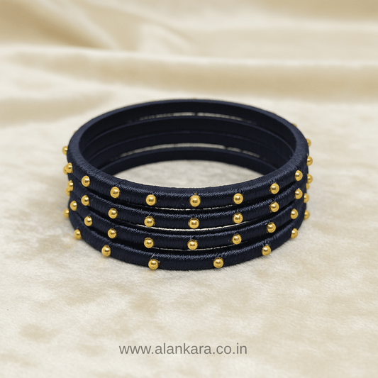 Navy Blue Golden Silk Thread Bangles with golden bead detailing, perfect for ethnic and festive looks.