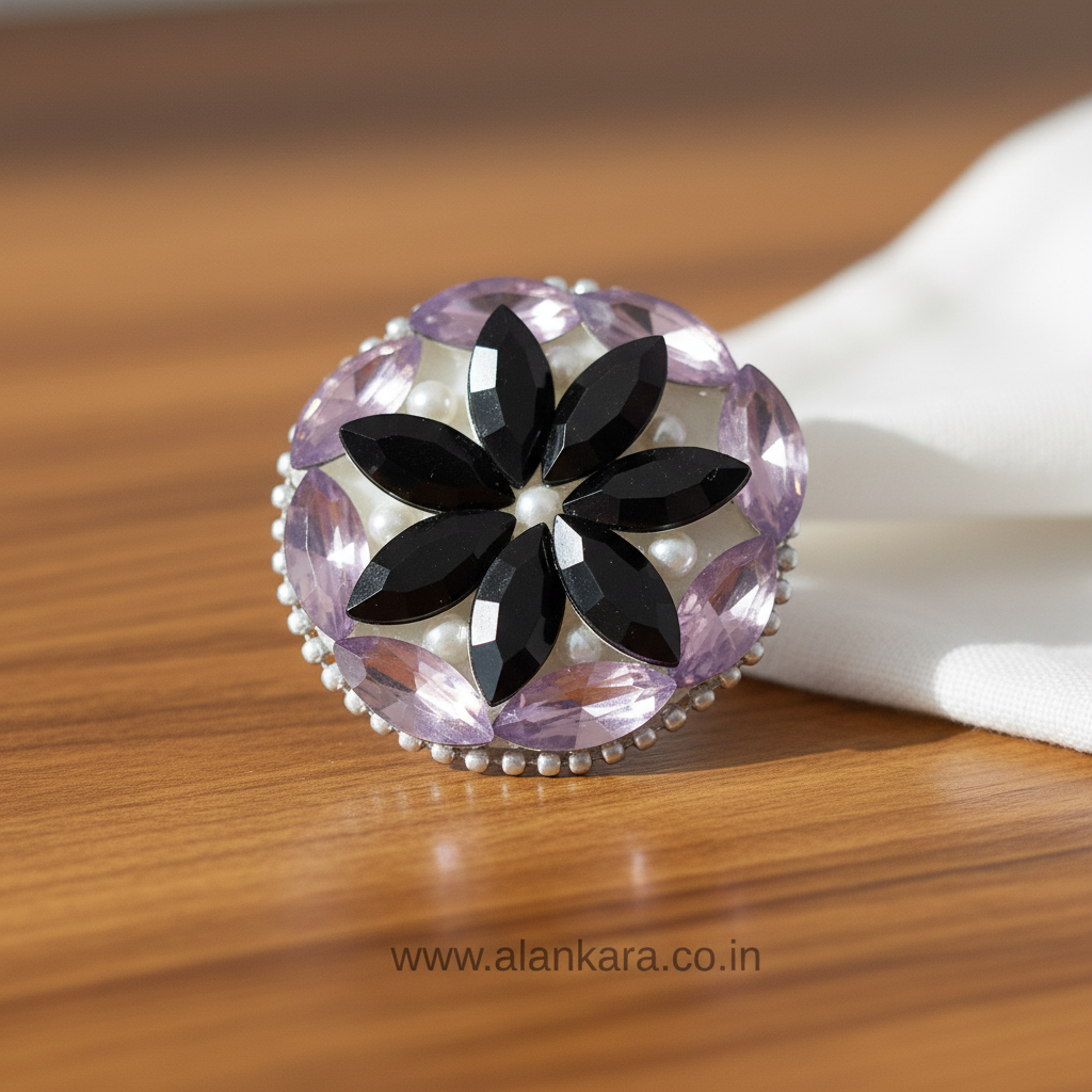 Lavender & Black Floral Crystal Saree Pin featuring a round floral design with sparkling crystals and pearls.