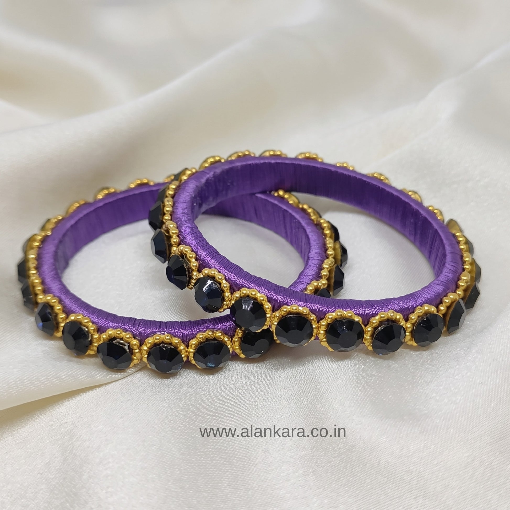 Royal Purple Crystal Silk Thread Kada Bangles featuring purple silk and dark blue crystals with golden beads.