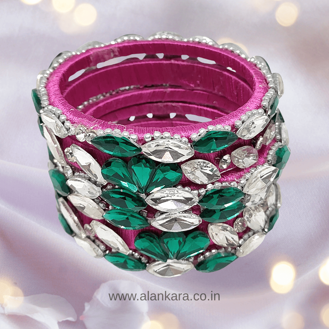 Rani Pink Emerald White Crystals Silk Thread Bangles showcasing vibrant crystals and silk threads for a luxurious look.