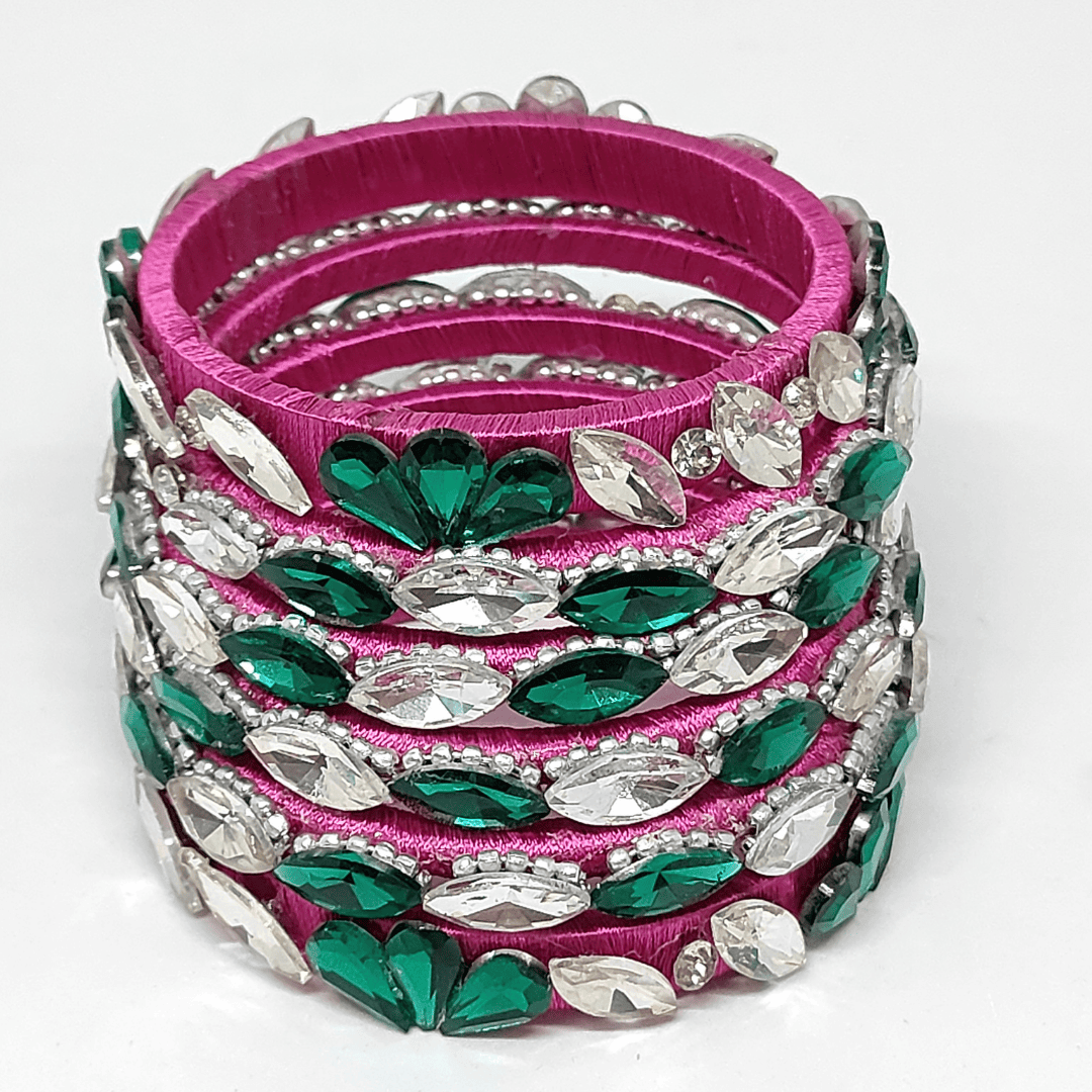 Rani Pink Emerald White Crystals Silk Thread Bangles featuring vibrant pink silk, green emerald, and sparkling white crystals.