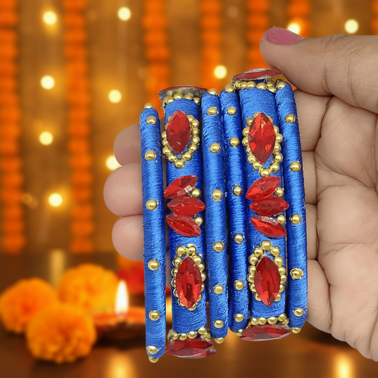 Royal Blue Red crystal silk thread bangles with red crystals and golden beads, handmade for festive occasions.