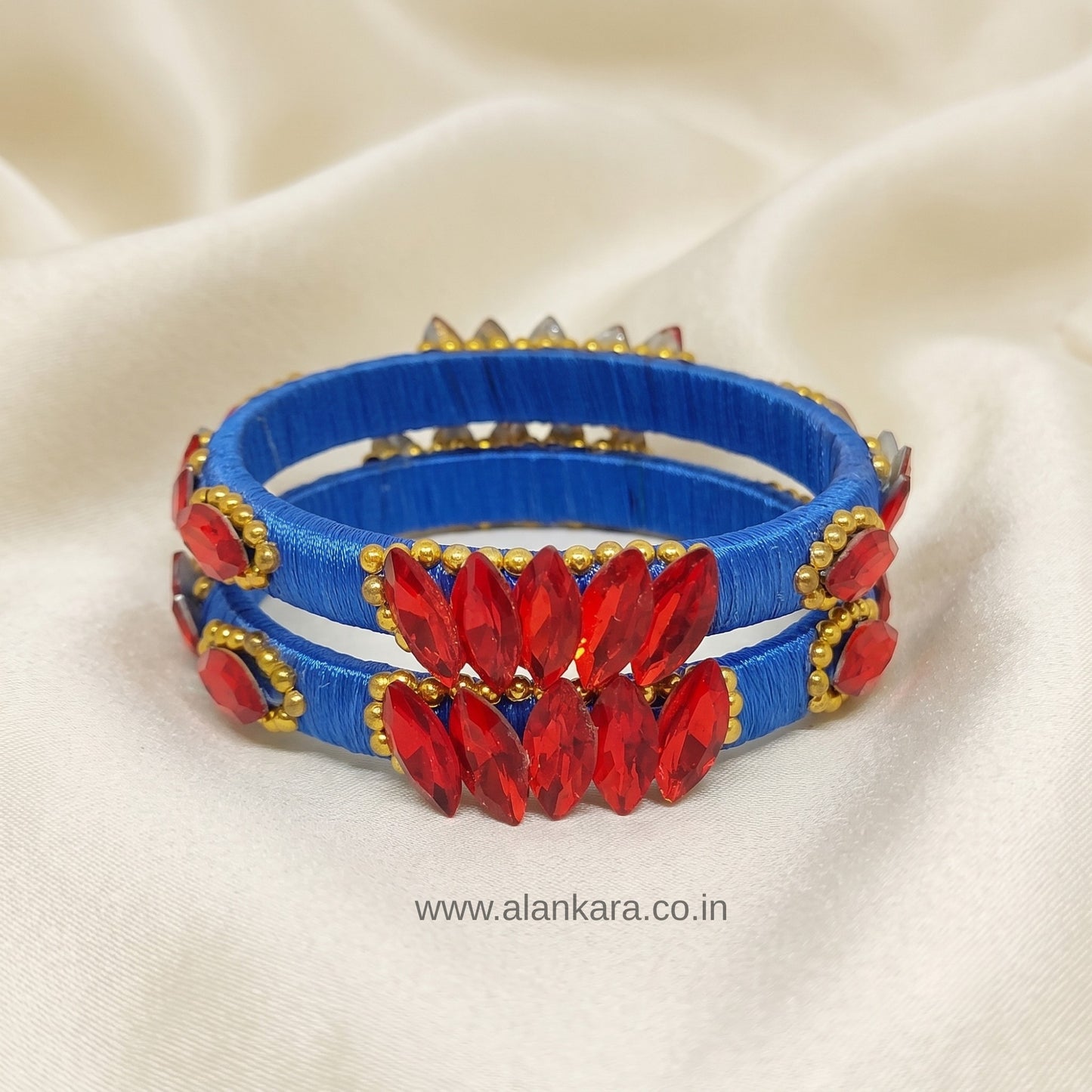 Royal Blue Red Crystal Silk Thread Kada Bangles featuring vibrant blue silk and striking red crystals.