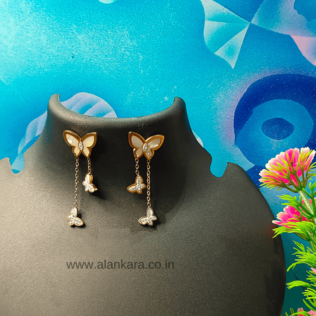 White butterfly dangler earrings