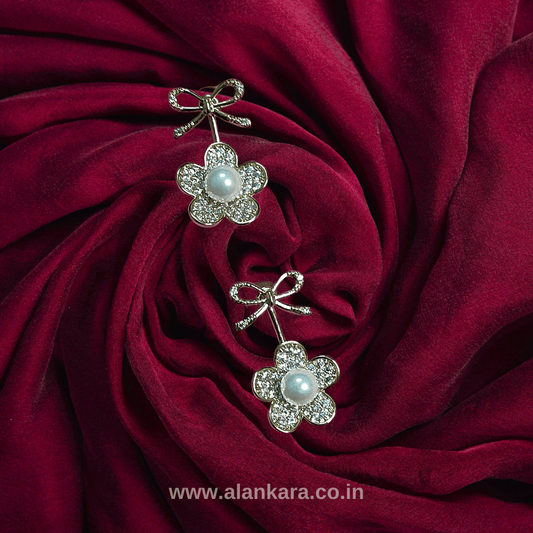 Stylish Western earrings white pearl bow studs | ALANKARA