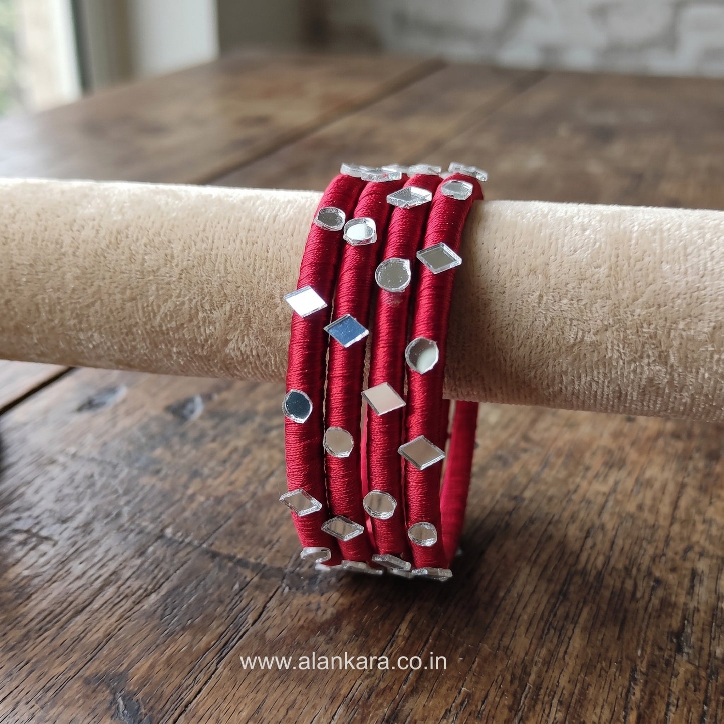 White Maroon Silk Thread Bangles featuring rich university red fabric and silver mirror embellishments.