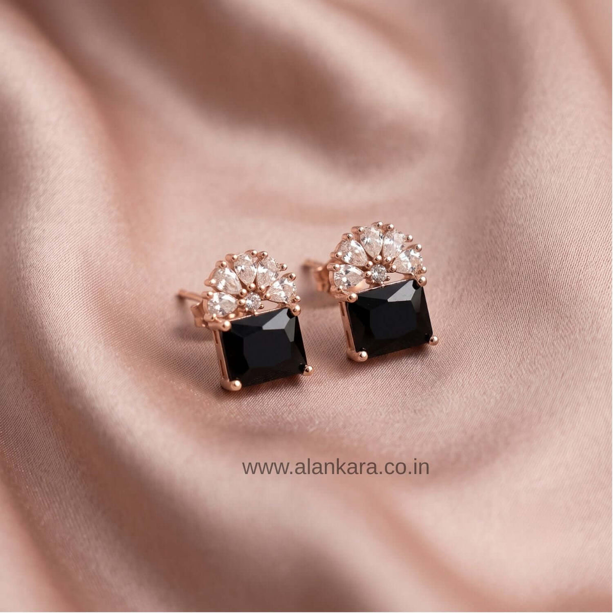 Black floral Crystal Stud earrings with cubic zirconia stones on a rose gold setting.
