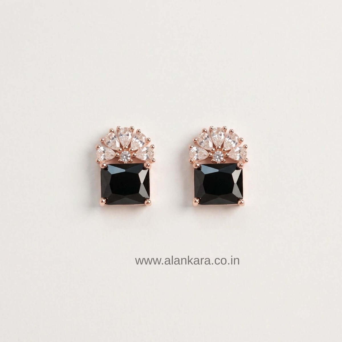 Black floral Crystal Stud earrings with black and clear stones in rose gold setting.