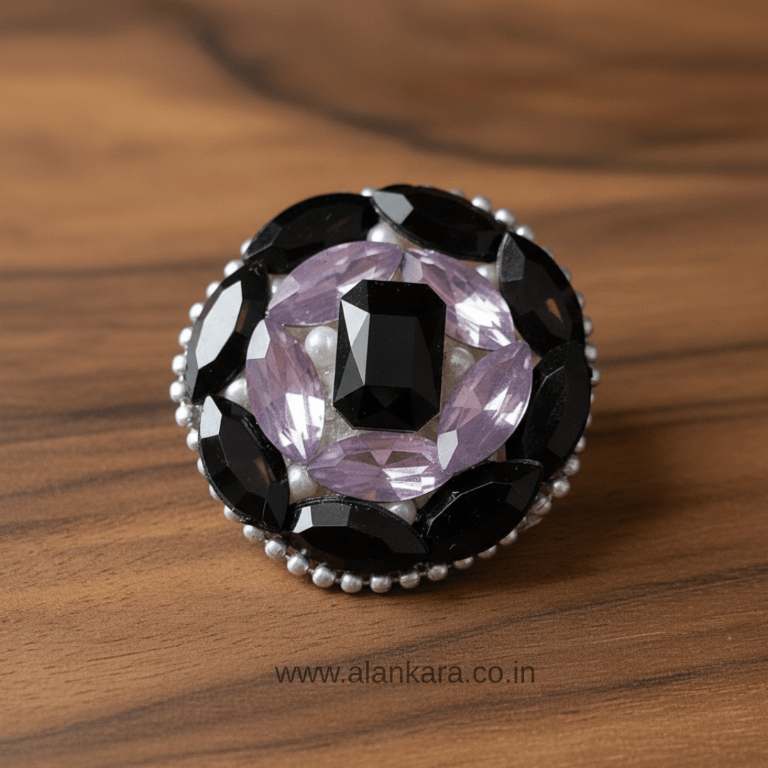 Black Orchid Crystal Pearl Saree Pin featuring black and lavender crystals, pearls, and beads in a round floral design.