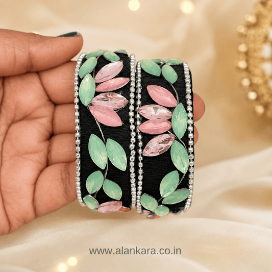 Black Pastel Crystal Silk Thread Kada Bangles featuring floral design with green and pink crystals on black silk.