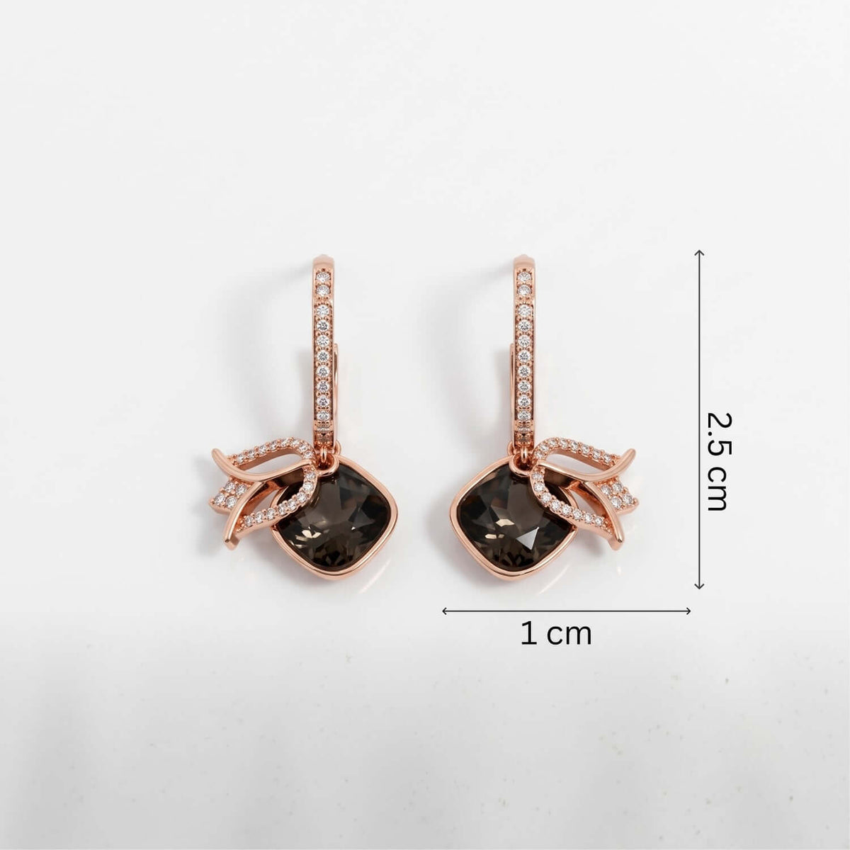 Black lotus Crystal Stud earrings in rose gold with cubic zirconia, dimensions 2.5 cm x 1 cm.