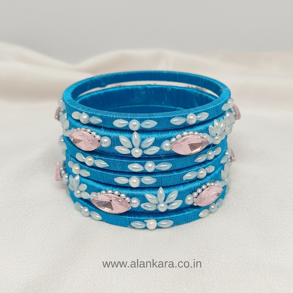 Blue Pearl Crystal Silk Thread Bangles stacked with crystals and pearls on silk threads.