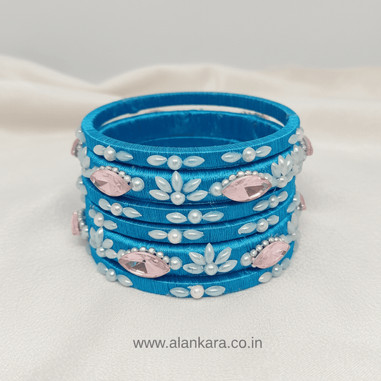 Blue Pearl Crystal Silk Thread Bangles stacked with crystals and pearls on silk threads.
