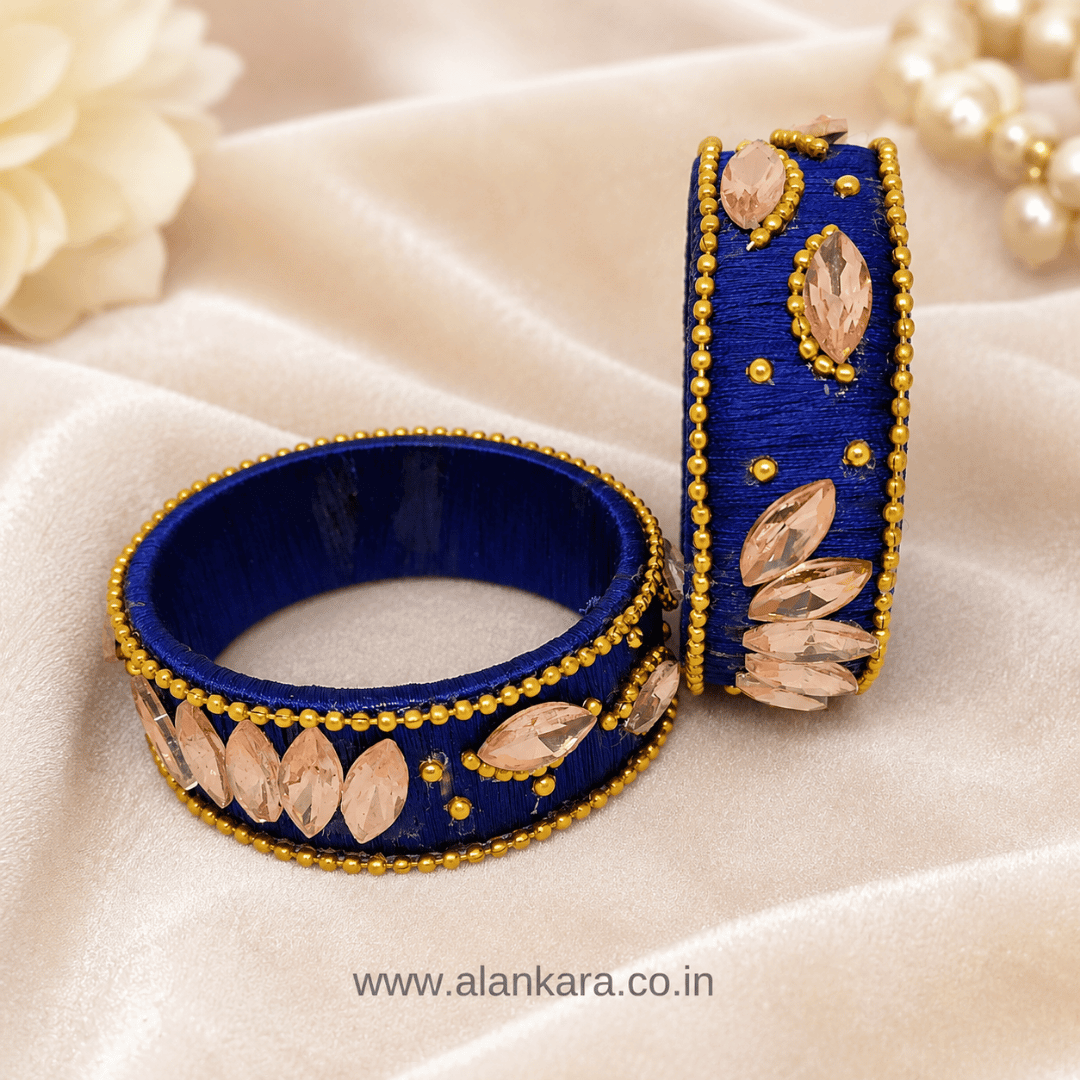 Navy Blue Peach Crystal Silk Thread Kada Bangles with peach marquise crystals and golden beads.