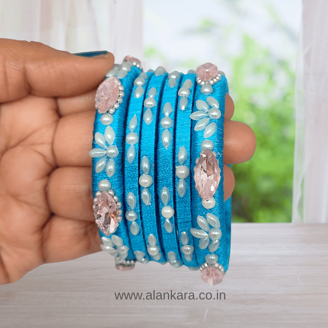 Blue Pearl Crystal Silk Thread Bangles featuring rich blue silk with crystals and pearls, handcrafted for elegant style.