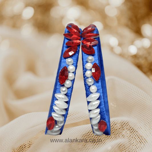 Royal blue floral pearl crystal silk thread bangles showcasing red crystals and white pearls in an elegant design.