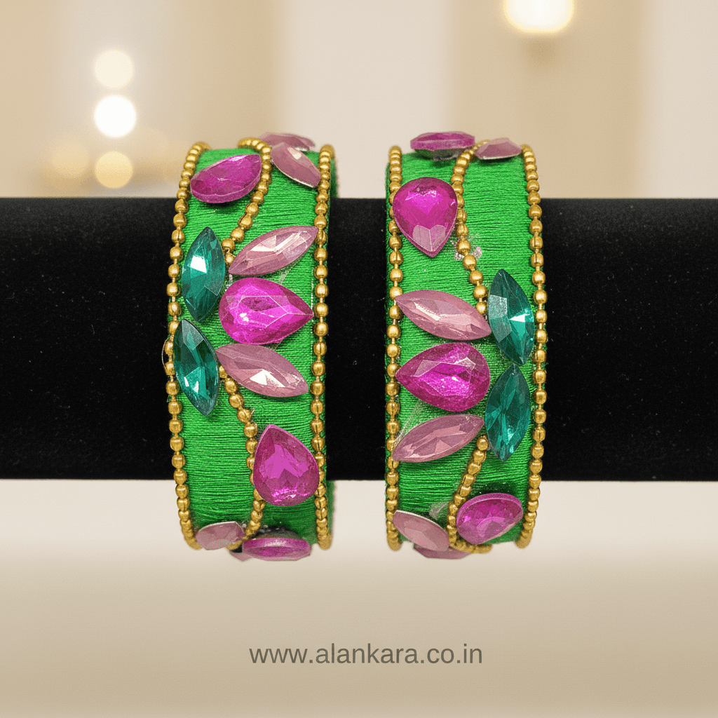 Parrot Green Floral Crystal Silk Thread Kada Bangles featuring pink teardrop and green marquise crystals on a silk base.