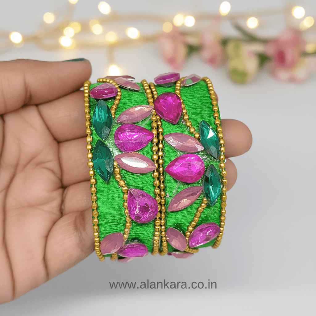 Parrot Green Floral Crystal Silk Thread Kada Bangles with pink and green crystals on a silk thread base.