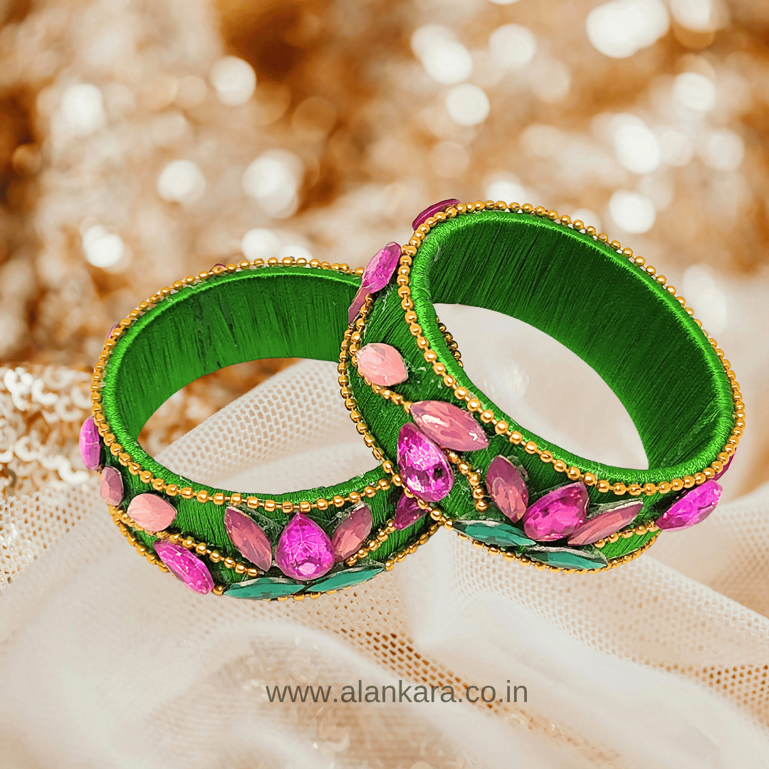 Parrot Green Floral Crystal Silk Thread Kada Bangles featuring pink teardrop crystals for festive wear.