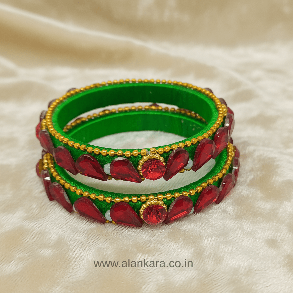 Green & Red Silk Thread Kada Bangles featuring green silk thread and red crystals on a soft background.