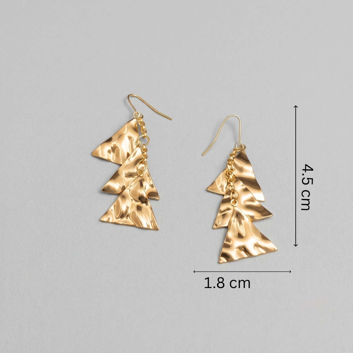 Golden Triangles Dangler earrings featuring a stylish layered triangle design in a shiny gold finish.