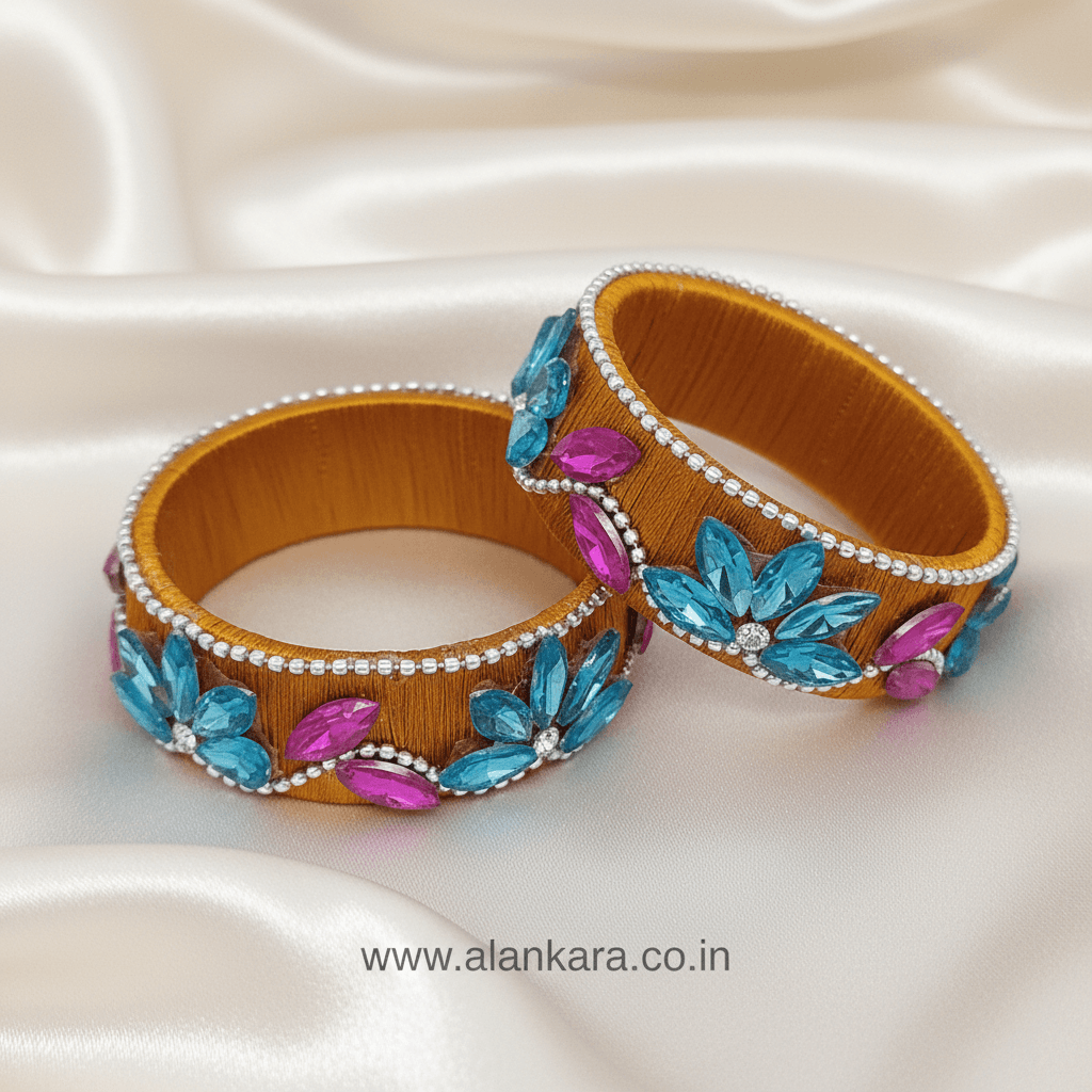 Mustard Floral Crystal Silk Thread Kada Bangles featuring aqua blue and pink crystals on a silk thread base.