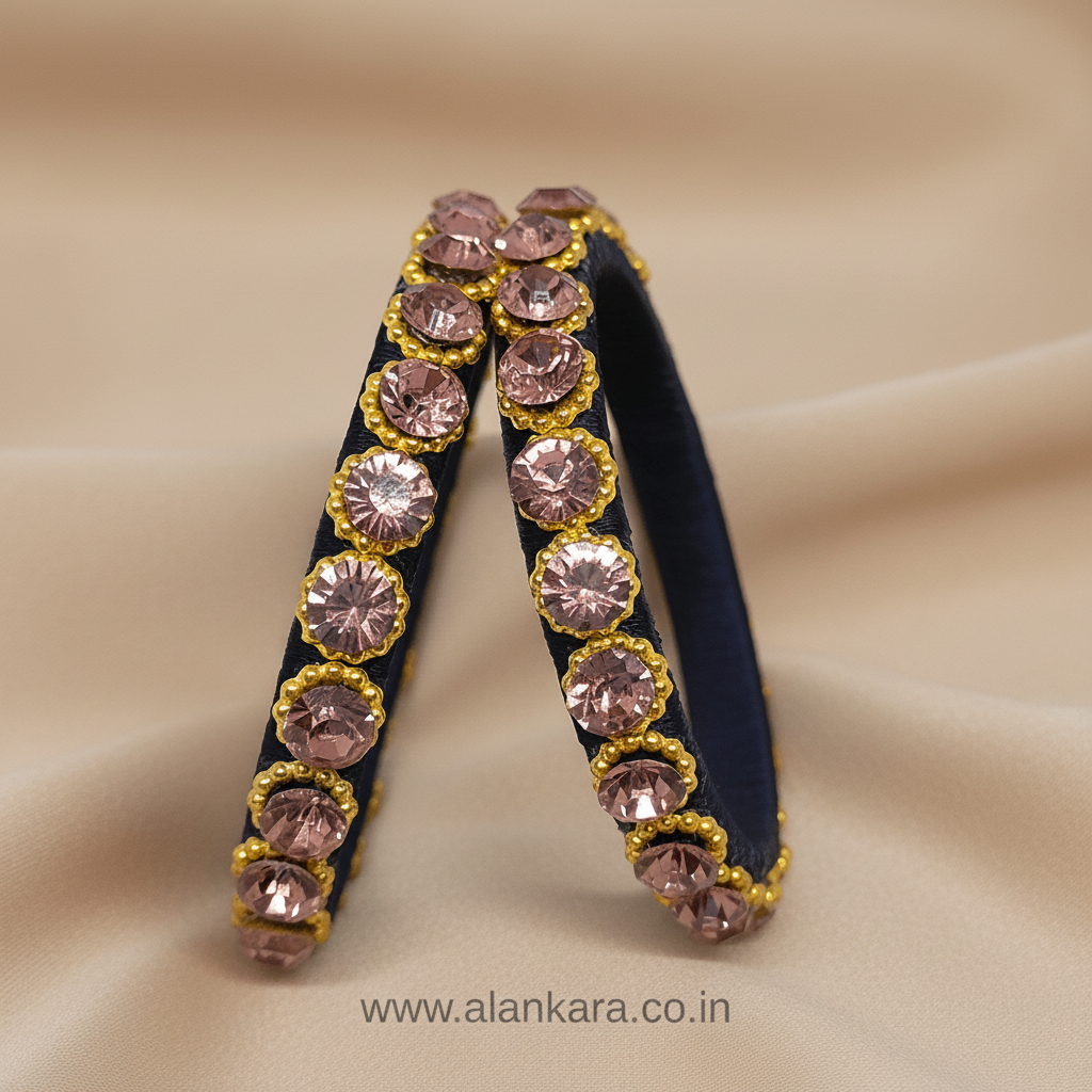 Navy Blue Crystal Silk Thread Kada Bangles adorned with blush-pink crystals and golden beads on a soft background.