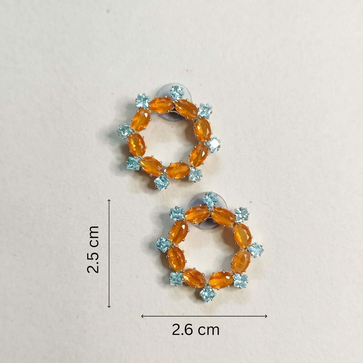 Orange Crystal Stud earrings featuring orange and blue cubic zirconia stones, dimensions 2.5 cm x 2.6 cm.