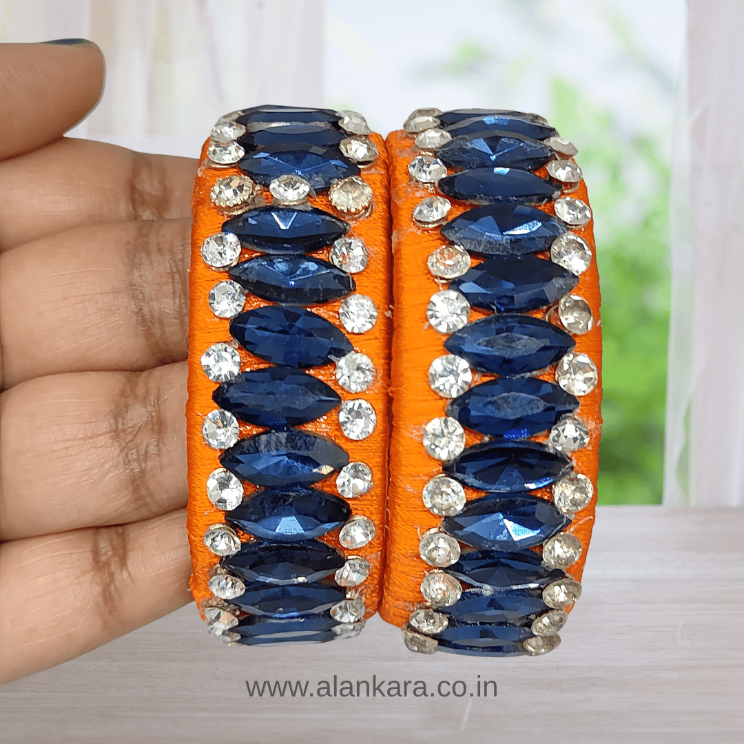 Orange Blue Crystal Silk Thread Kada Bangles featuring blue marquise crystals and white zircon stones on orange silk.