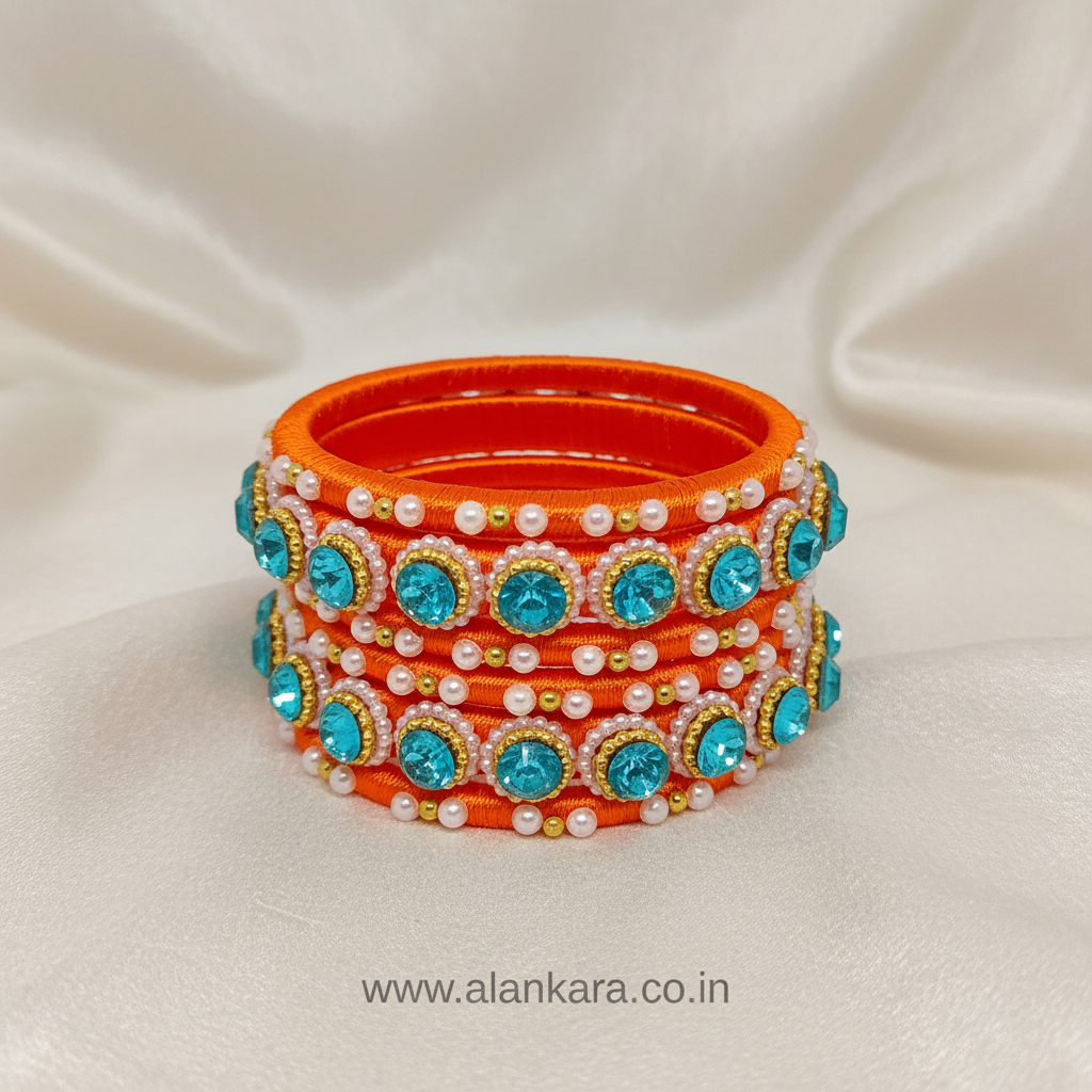 Orange & Blue Pearl Silk Thread Bangles featuring vibrant orange silk with blue crystals and white pearls.