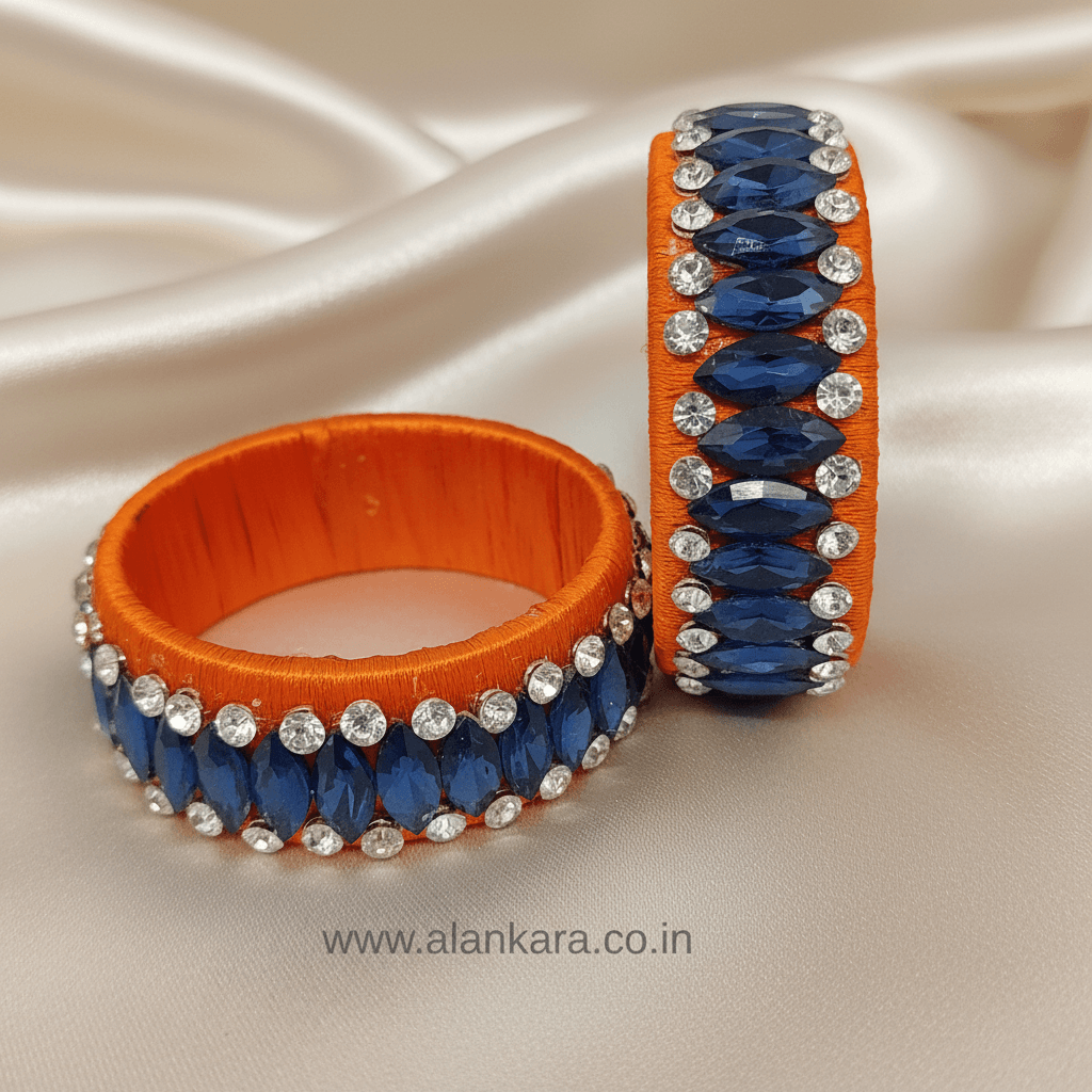 Orange Blue Crystal Silk Thread Kada Bangles featuring deep blue marquise crystals and white zircon accents on orange silk.