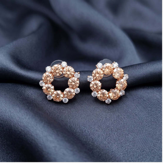 Peach Crystal Stud earrings featuring golden alloy and cubic zirconia stones, perfect for Indian and western outfits.