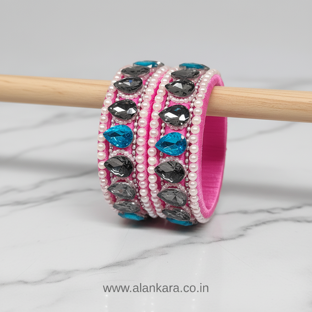 Pink Pearl Crystal Silk Thread Bangles featuring light pink silk, grey and blue crystals, and white pearls.