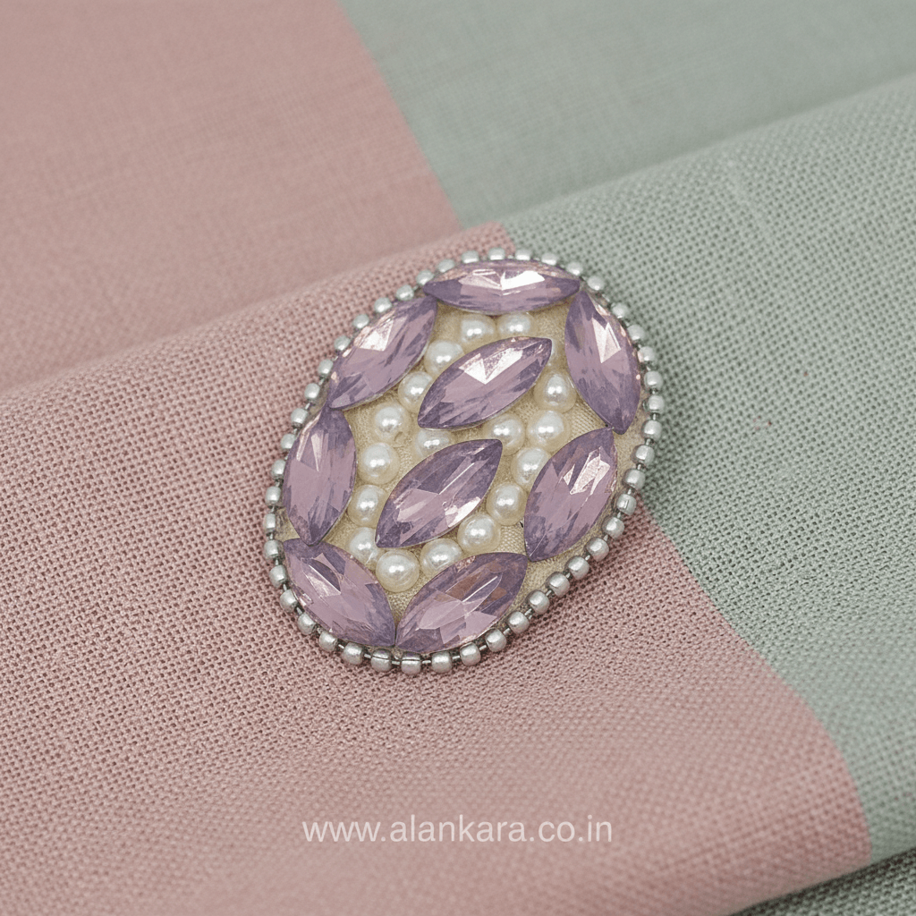 Lavender Crystal Pearl Saree Pin with sparkling crystals and delicate pearls on a soft fabric background.