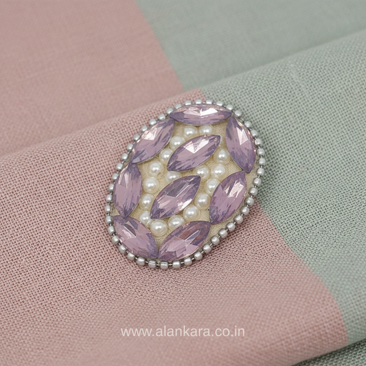 Lavender Crystal Pearl Saree Pin with sparkling crystals and delicate pearls on a soft fabric background.
