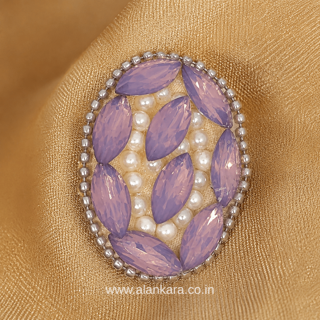Lavender Crystal Pearl Saree Pin featuring sparkling crystals and delicate pearls on a golden fabric.