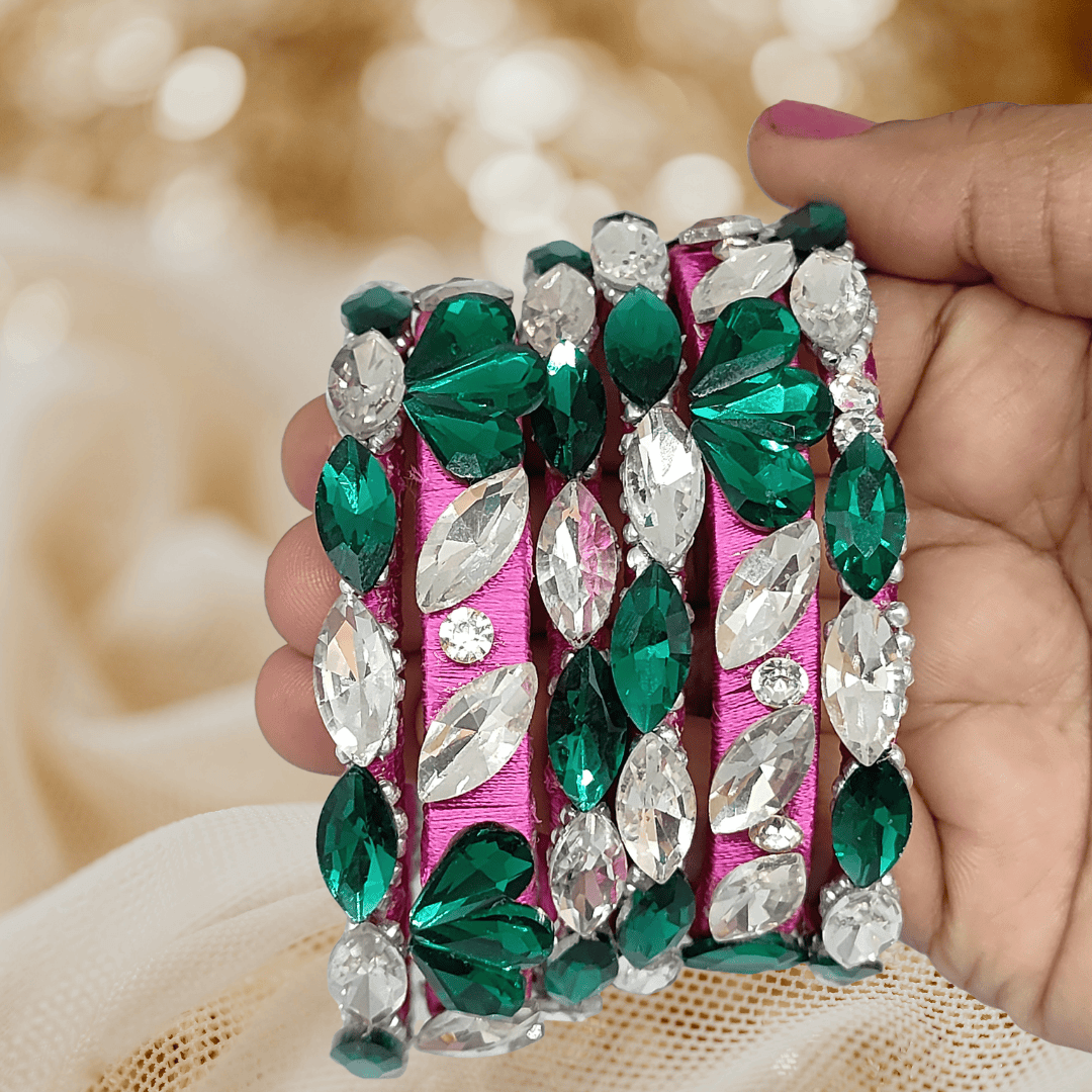 Rani Pink Emerald White Crystals Silk Thread Bangles featuring green and white crystals on a pink silk base.