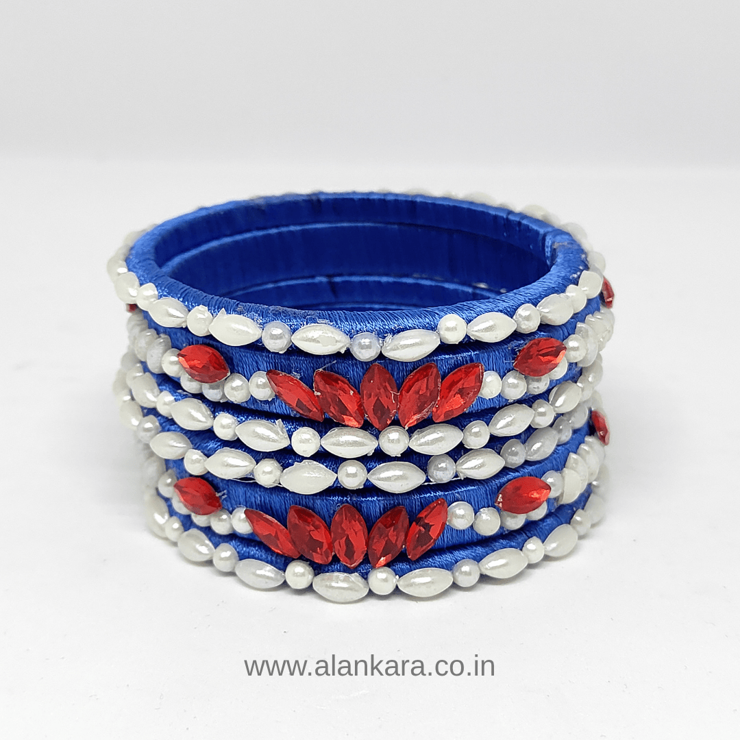 Royal blue Pearl Crystal silk thread bangles featuring elegant white and red embellishments.