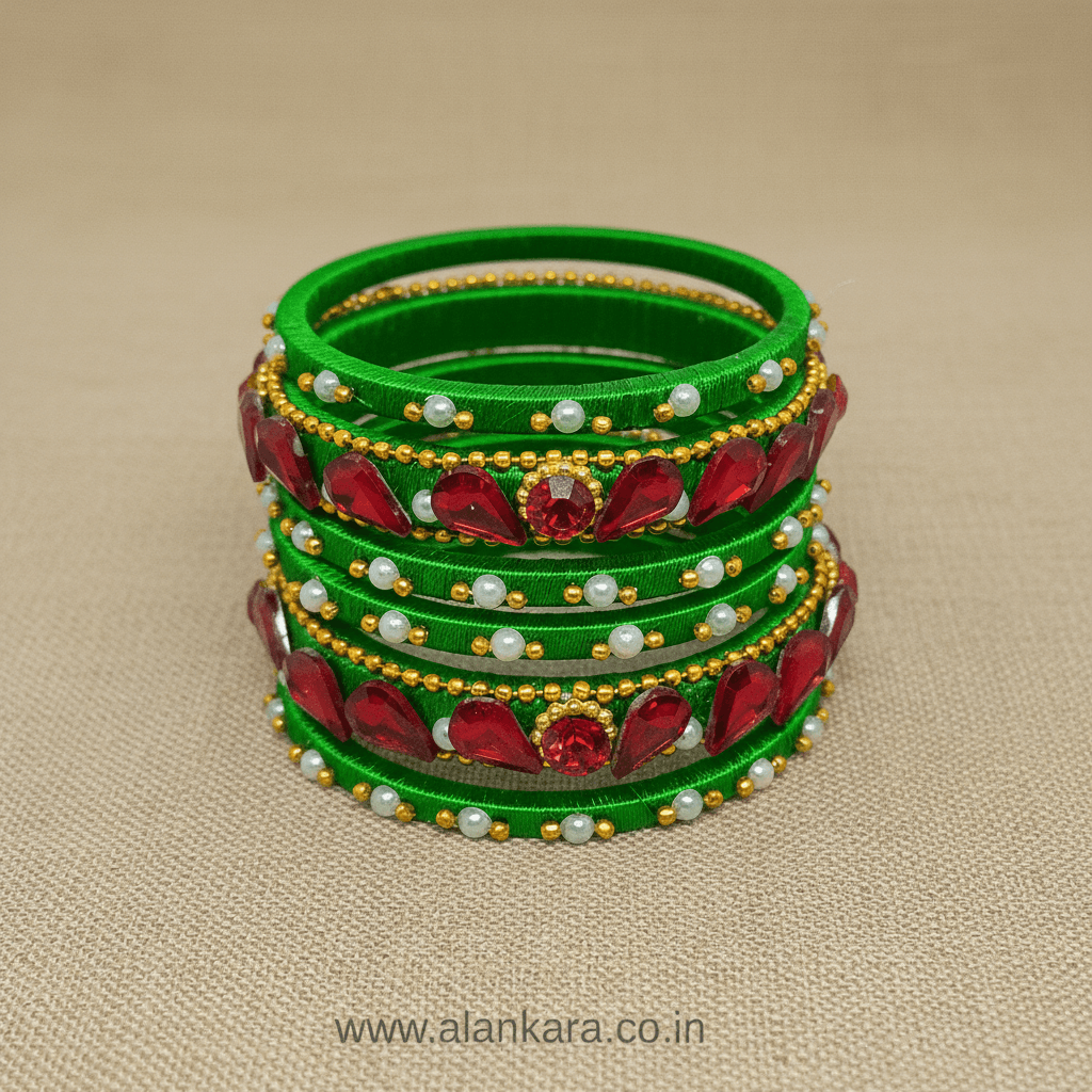 Green & Red Crystal Silk Thread Bangles stacked together showcasing vibrant colors and intricate design with pearls and beads.