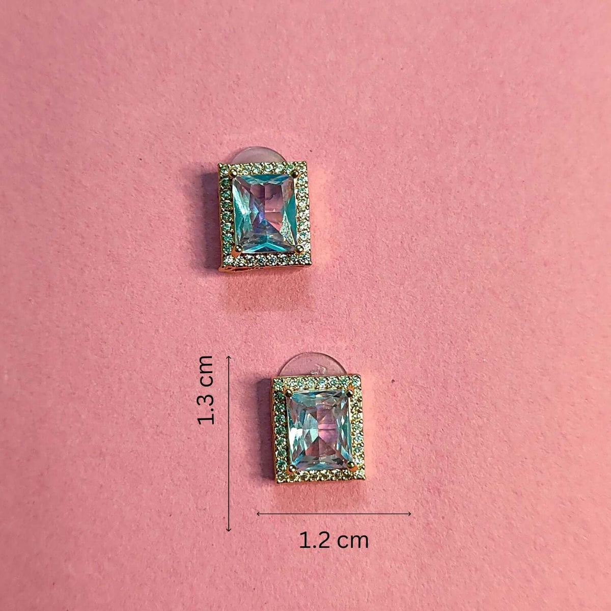 White Crystal Stud earring featuring a cubic zirconia stone with rose gold plating, measuring 1.2 x 1.3 cm.