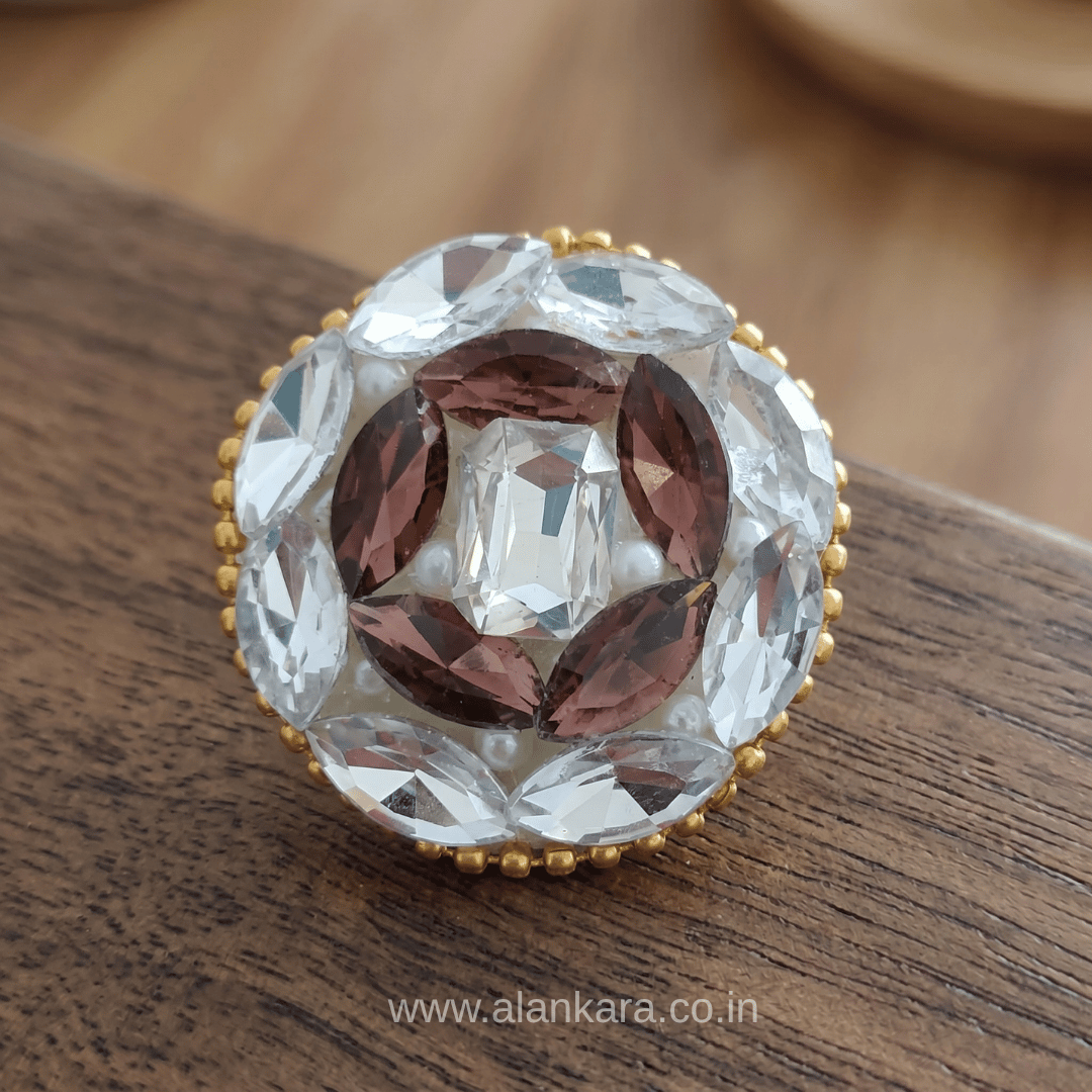White & Wine Crystal Pearl Saree Pin featuring sparkling crystals and pearls, designed to enhance your ethnic outfit.