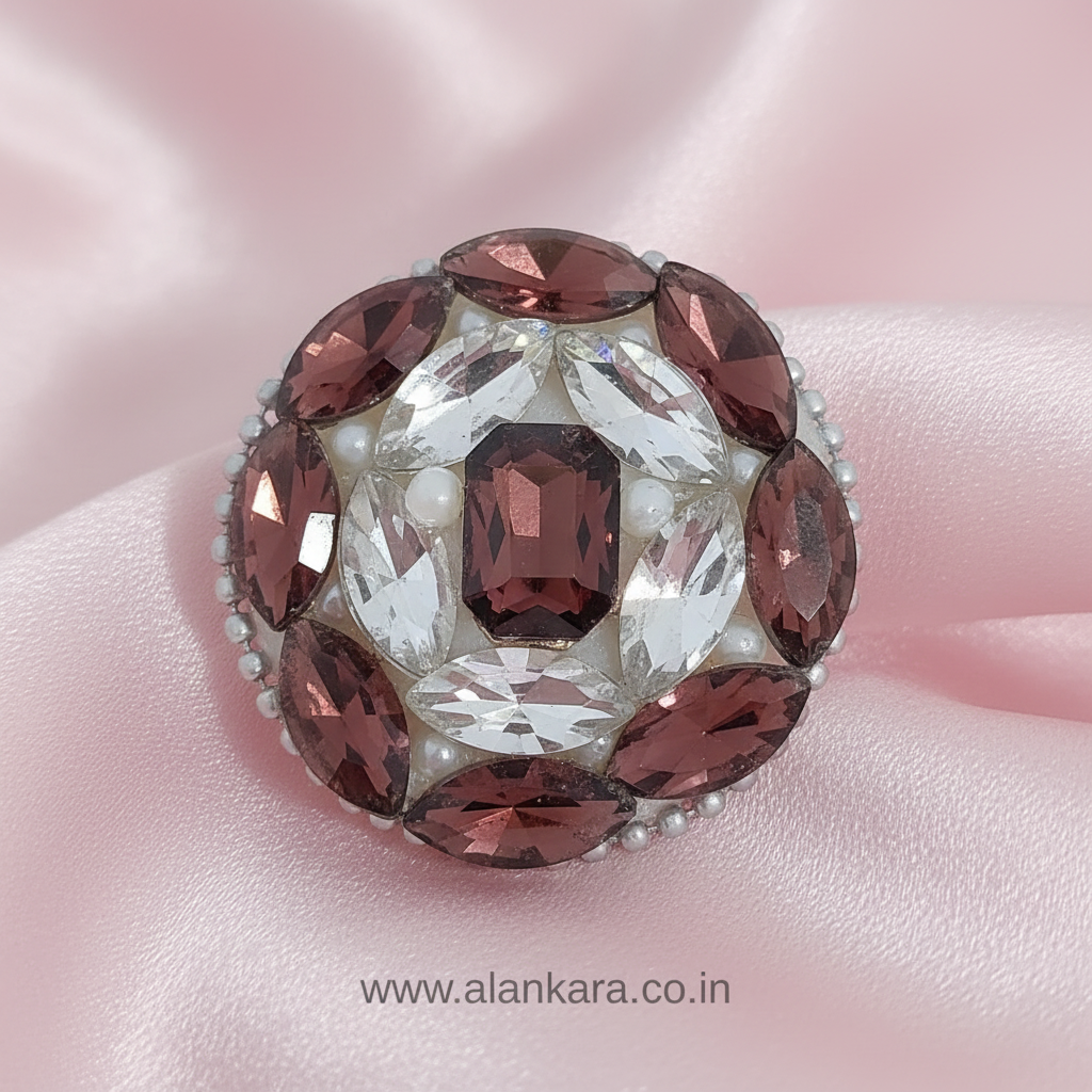 Wine & White Crystal Pearl Saree Pin with sparkling crystals and delicate pearls on soft pink fabric.