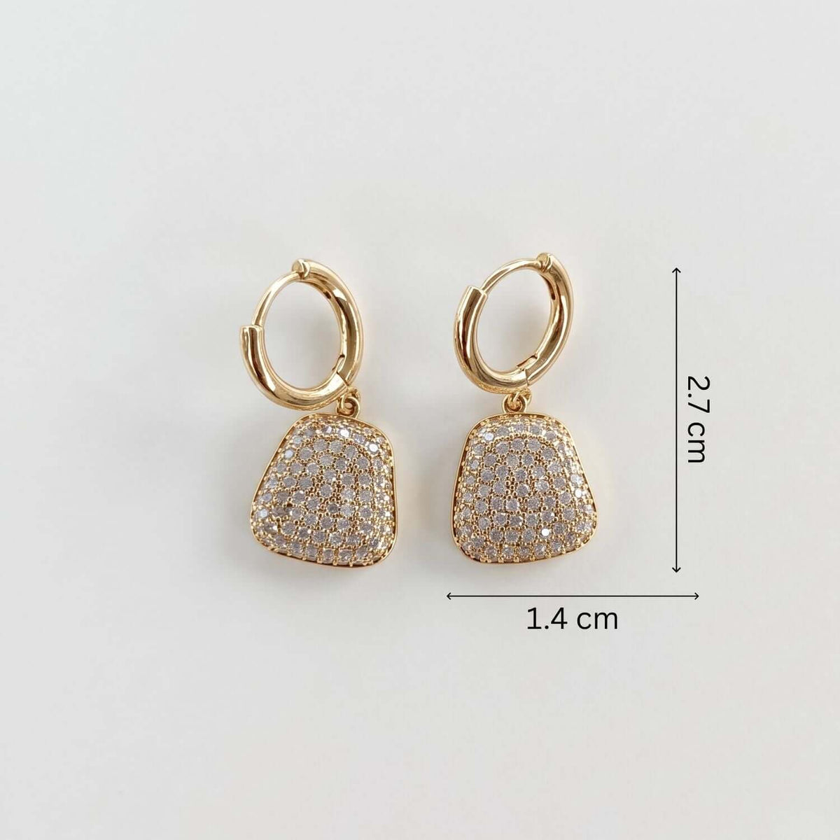 White Party Purse Stud earrings showcasing gold plating and cubic zirconium stones, dimensions 2.7 cm by 1.4 cm.