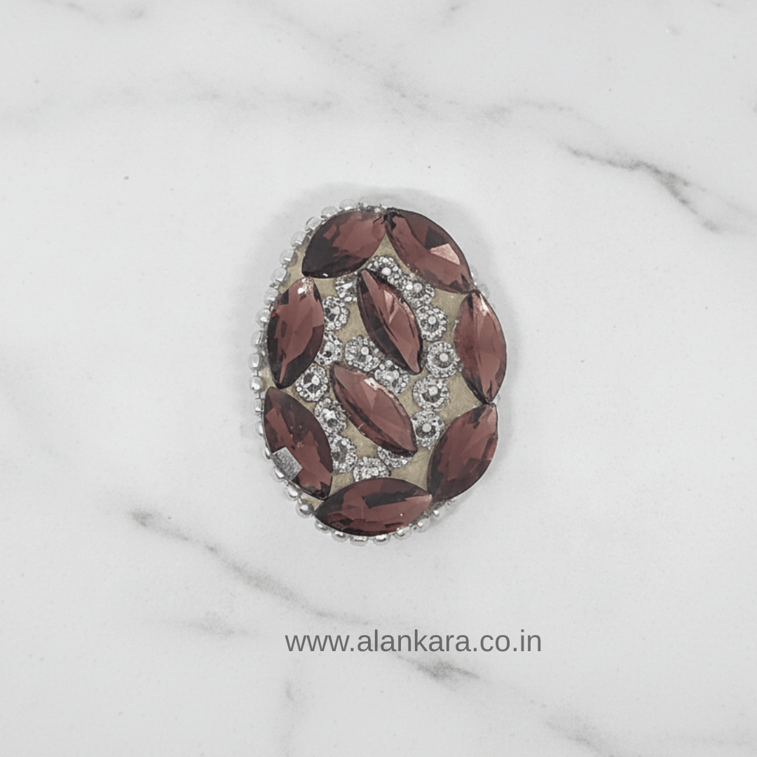 Wine Crystal Noori Saree Pin showcasing rich wine-colored crystals and elegant bead detailing.
